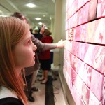 Admiring the One-Heart mosaic - photo by Meredith Jones.